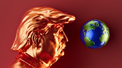 A golden trump looks at planet earth.