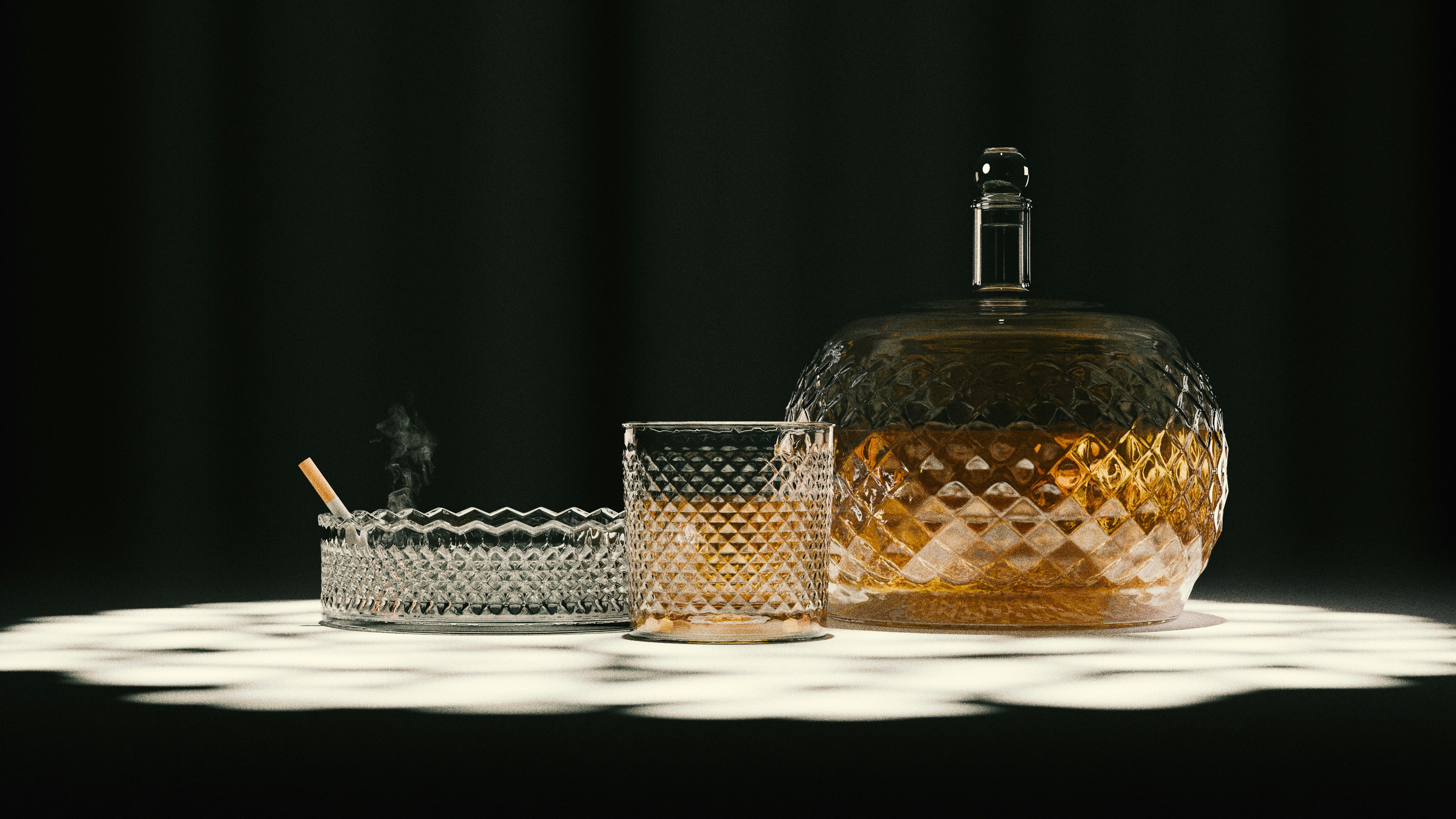 Whiskey, cigarette, and glassware are on display.