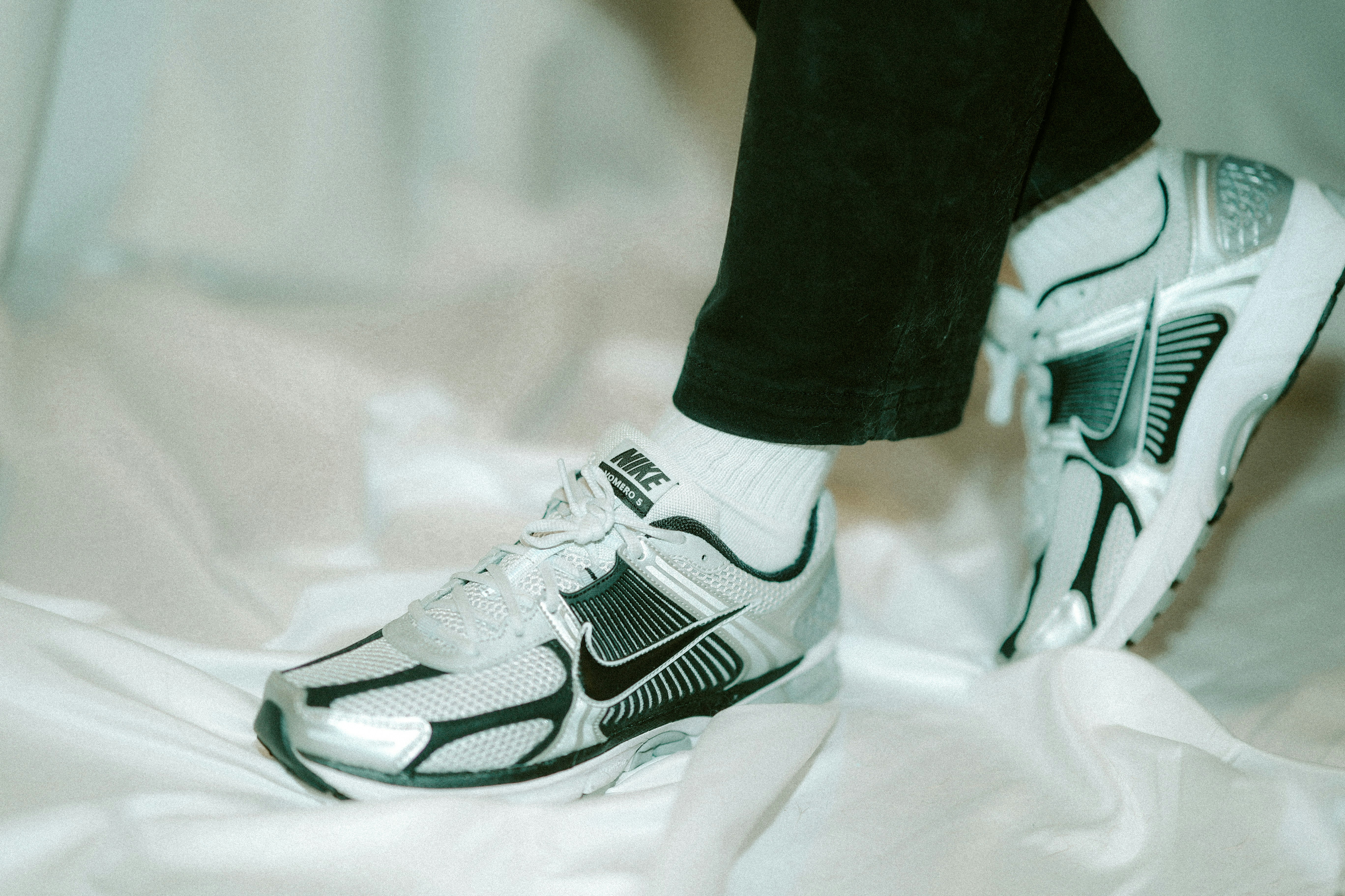 Person wearing Nike sneakers