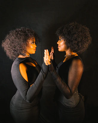 Two women look into each other's eyes.