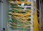 Yellow and green cables are neatly connected.