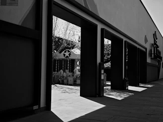 Doors open to reveal a carousel in the distance