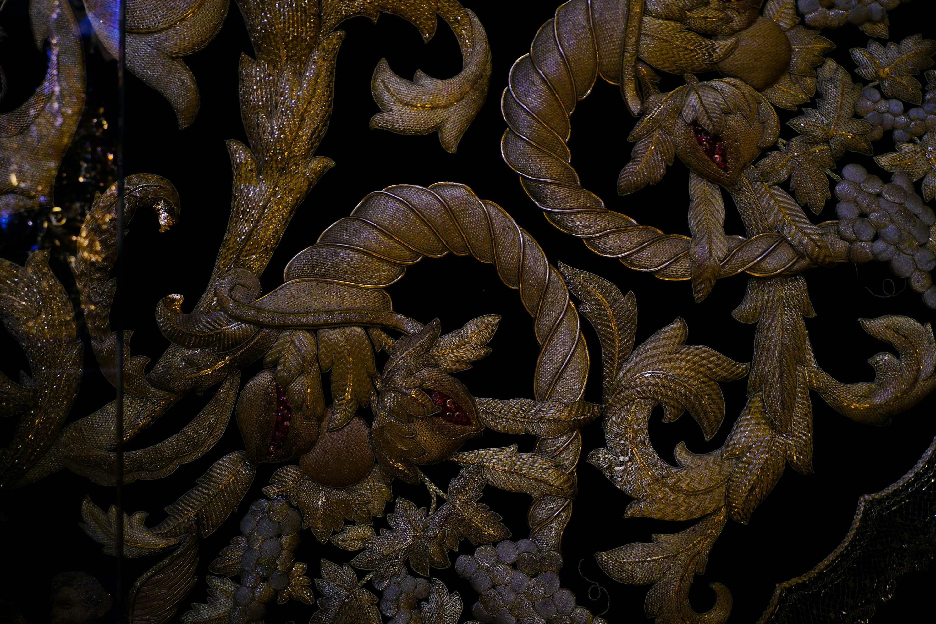 Ornate, carved wooden detail in close-up shot.