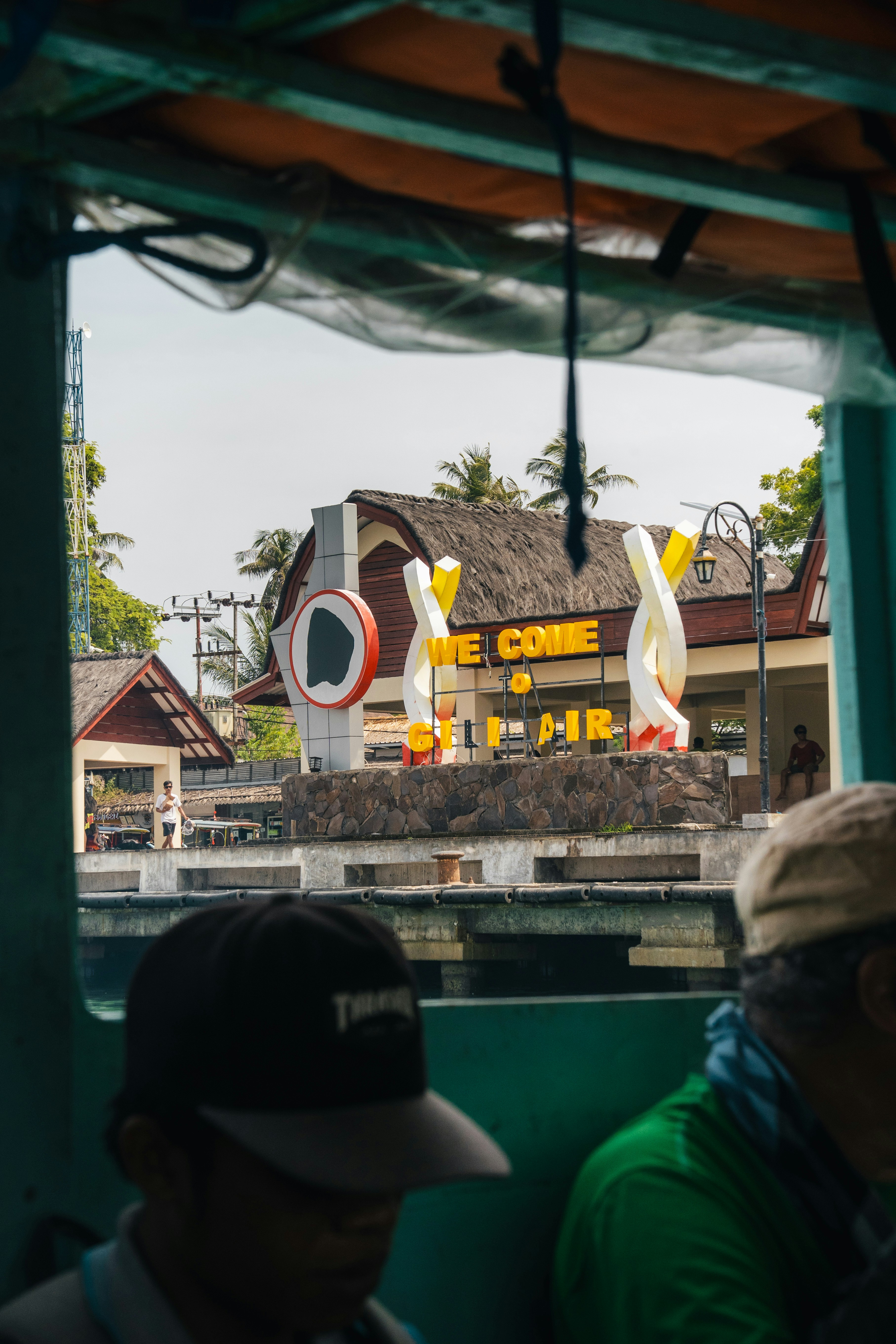 View of a welcome sign from a boat.