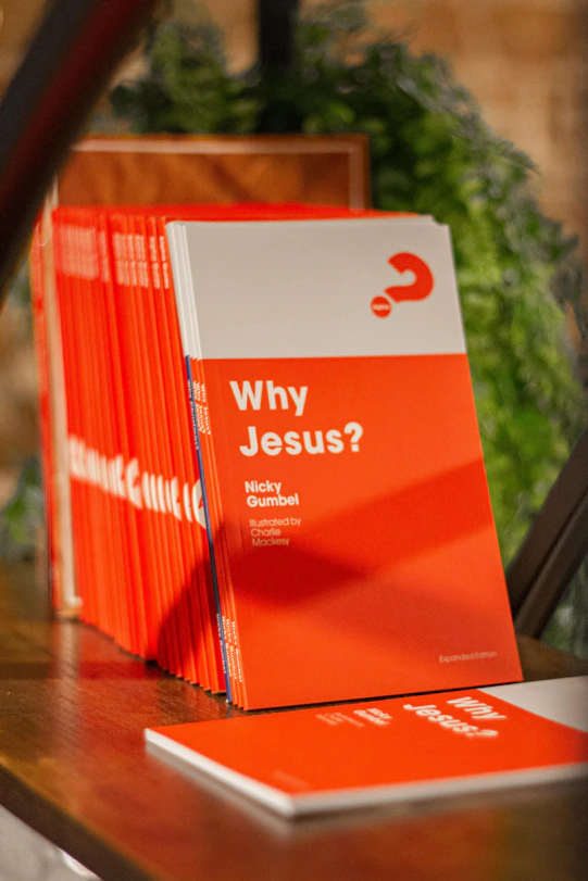 Books titled "why jesus?" are on display.