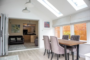 Elegant dining room and view of the kitchen.