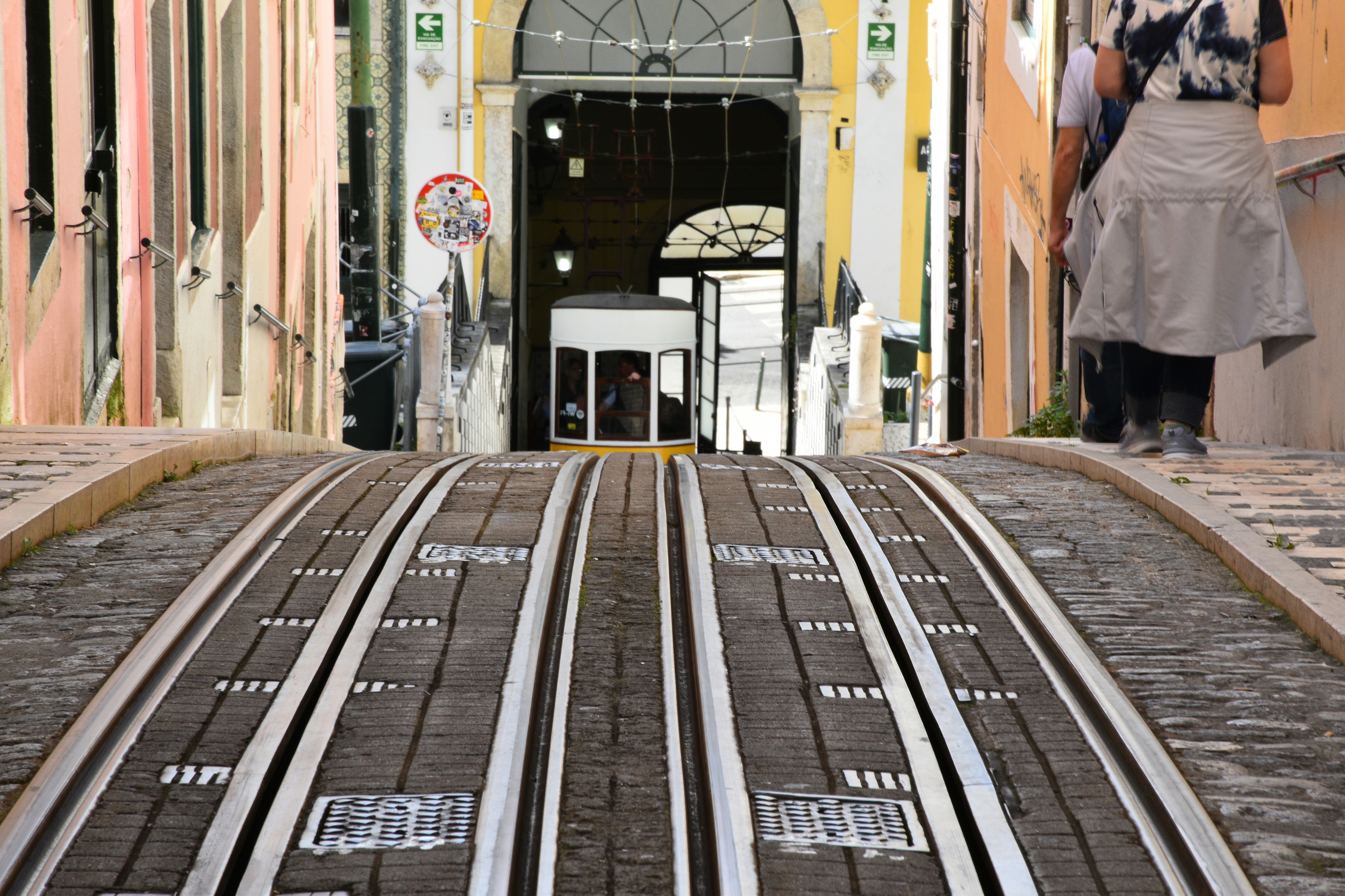 Tracks lead into an arched entryway.