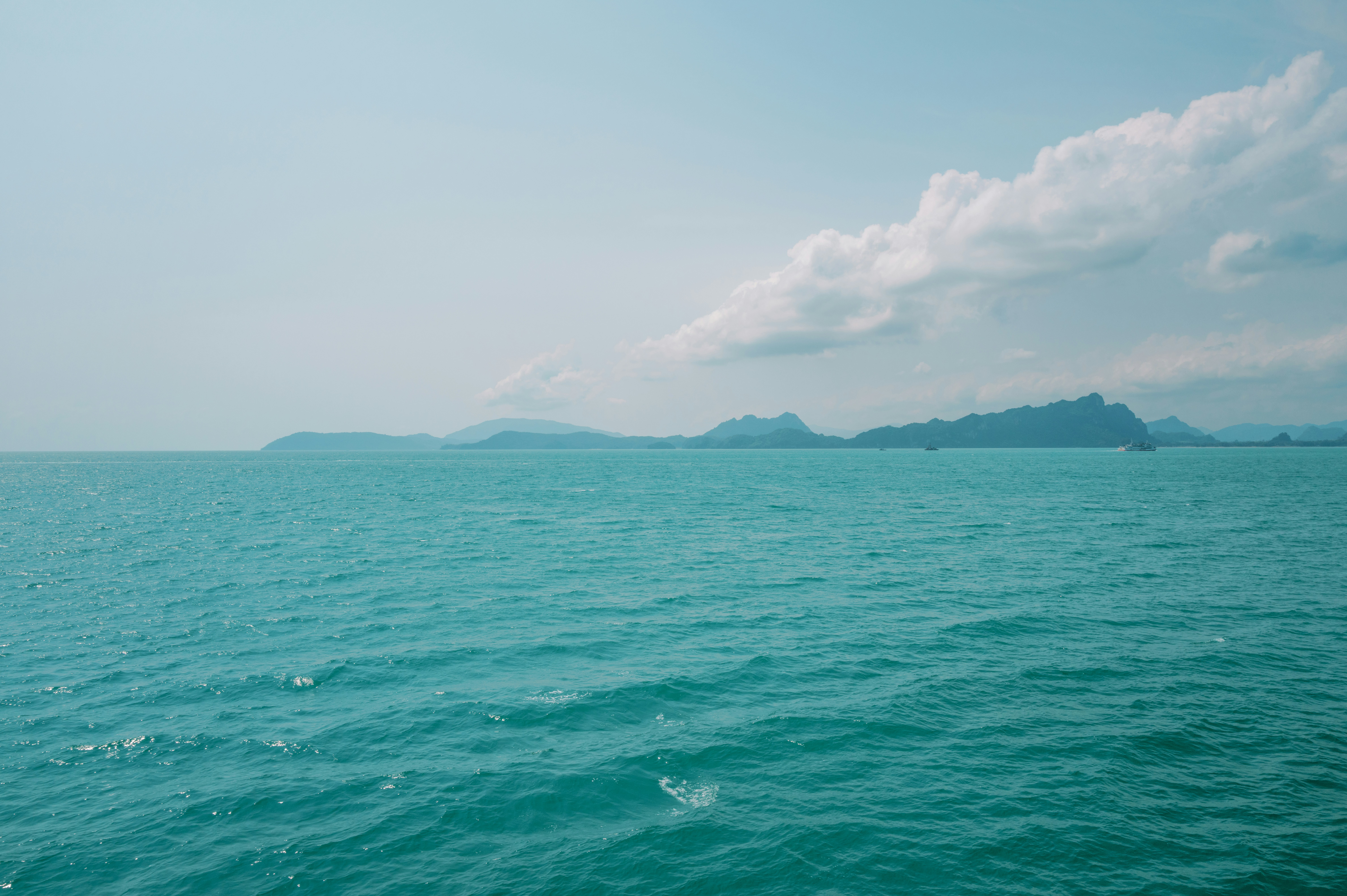 Ocean view with an island in the distance.