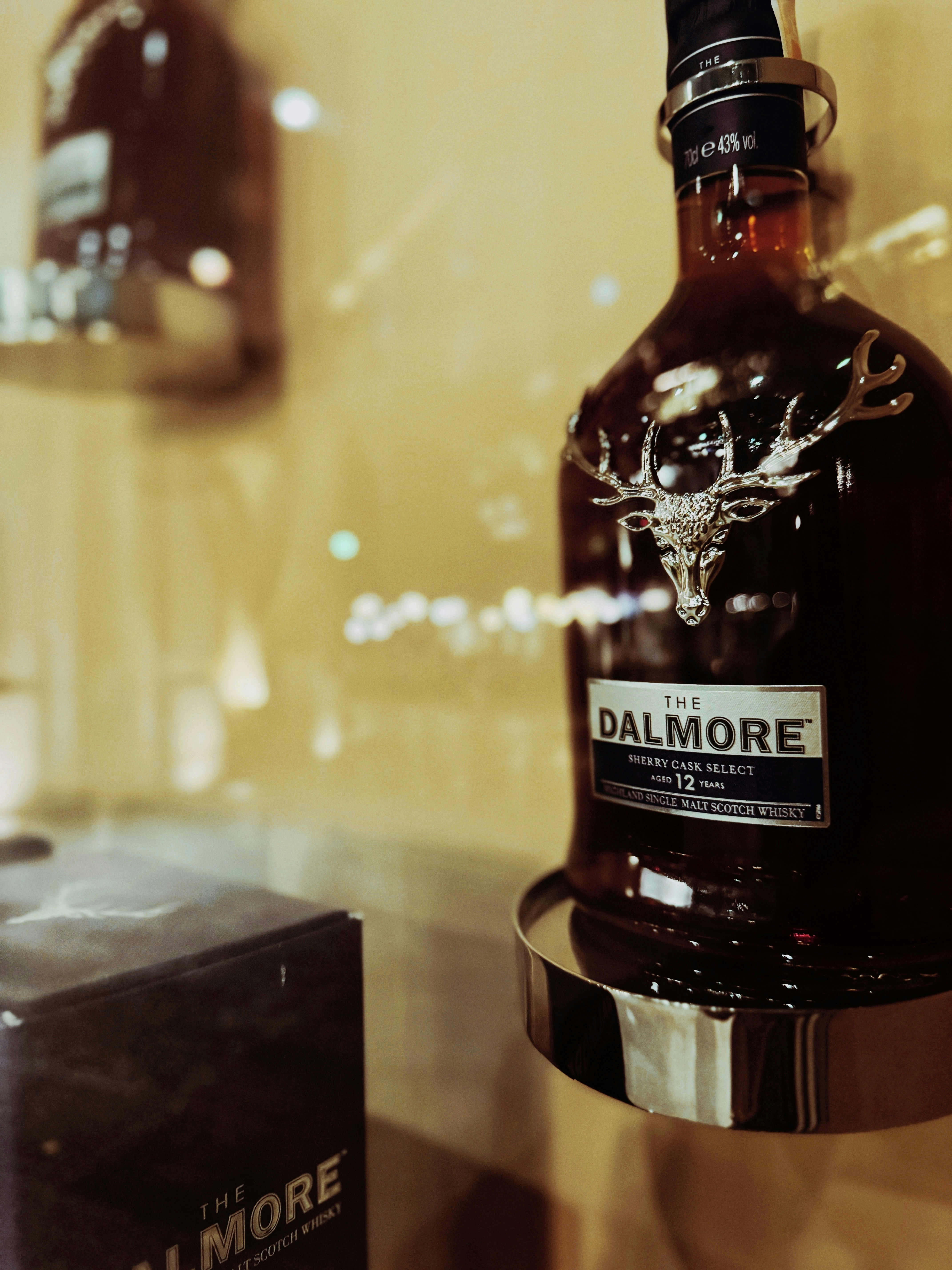 A bottle of dalmore whiskey is on display.
