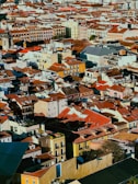 A dense cityscape of buildings and rooftops.