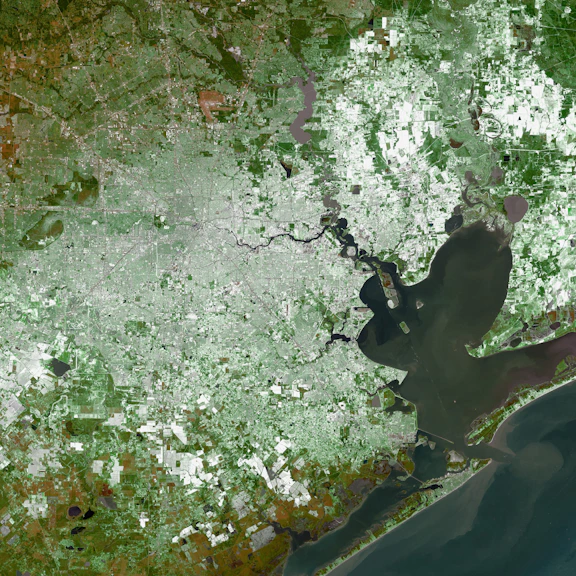 Aerial view of a coastal city and bay