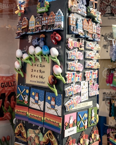 Souvenir magnets on display in a tourist shop.