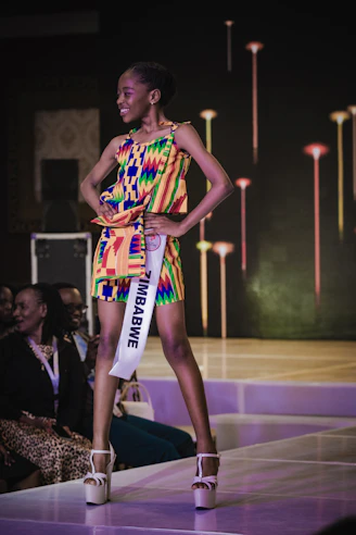 Miss zimbabwe poses during a pageant.