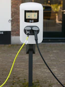 An electric vehicle charging station with two plugs