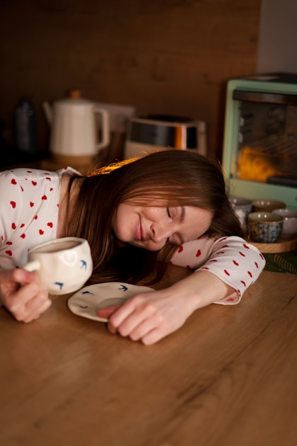 Tired parent resting with coffee - parental burnout neurodivergent families Sydney