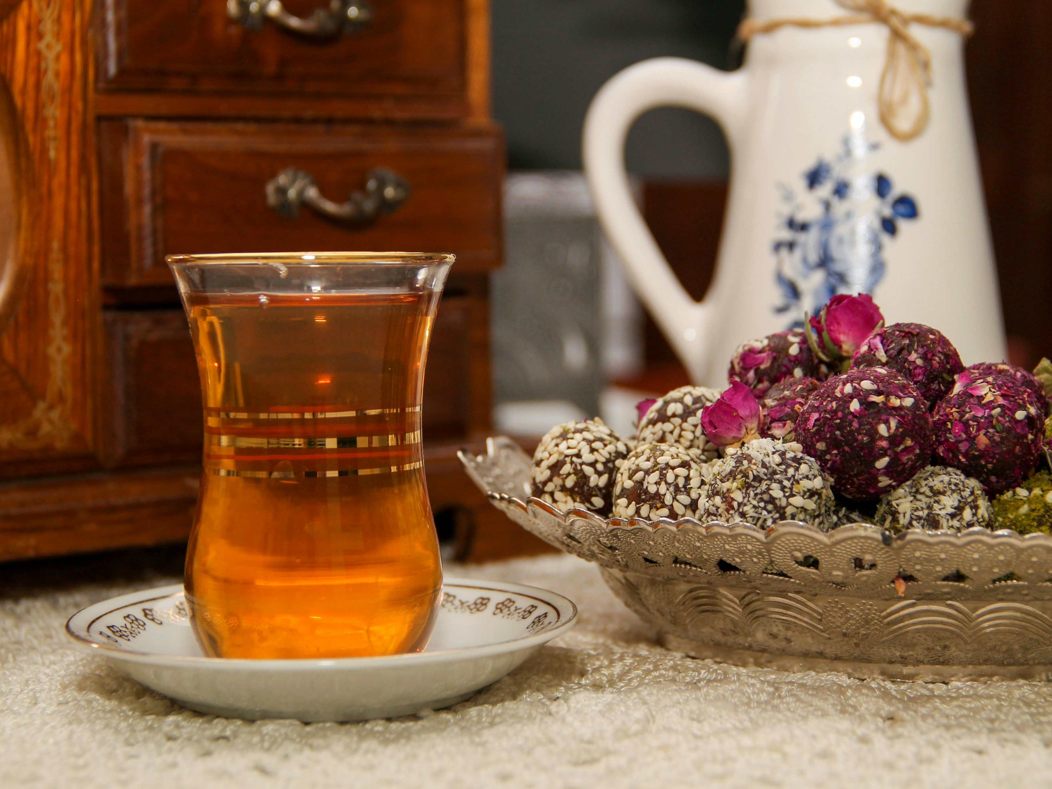 Tea and treats are ready for a delightful moment.