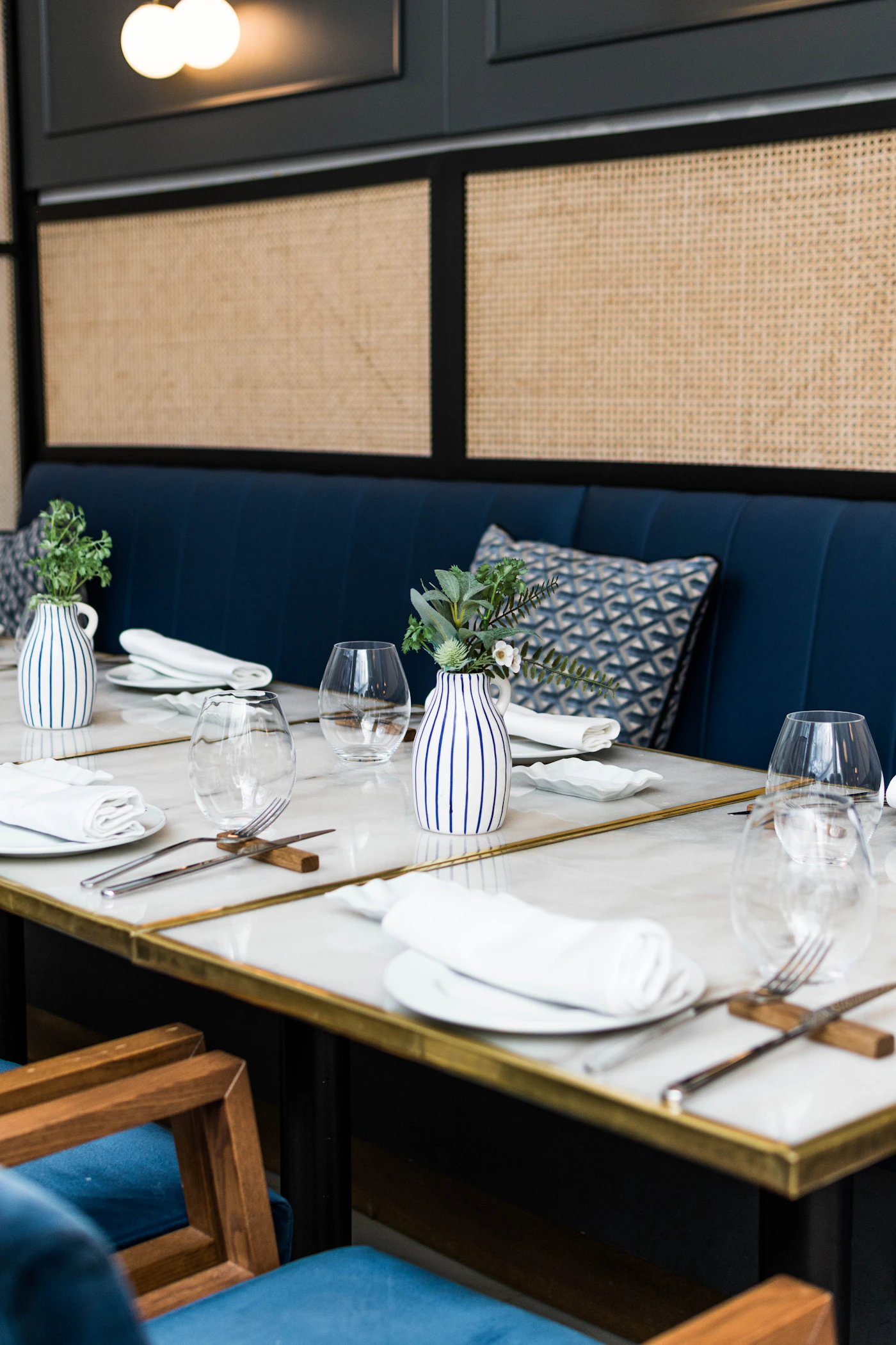 Refined dining table arranged with dinnerware flatware and glassware