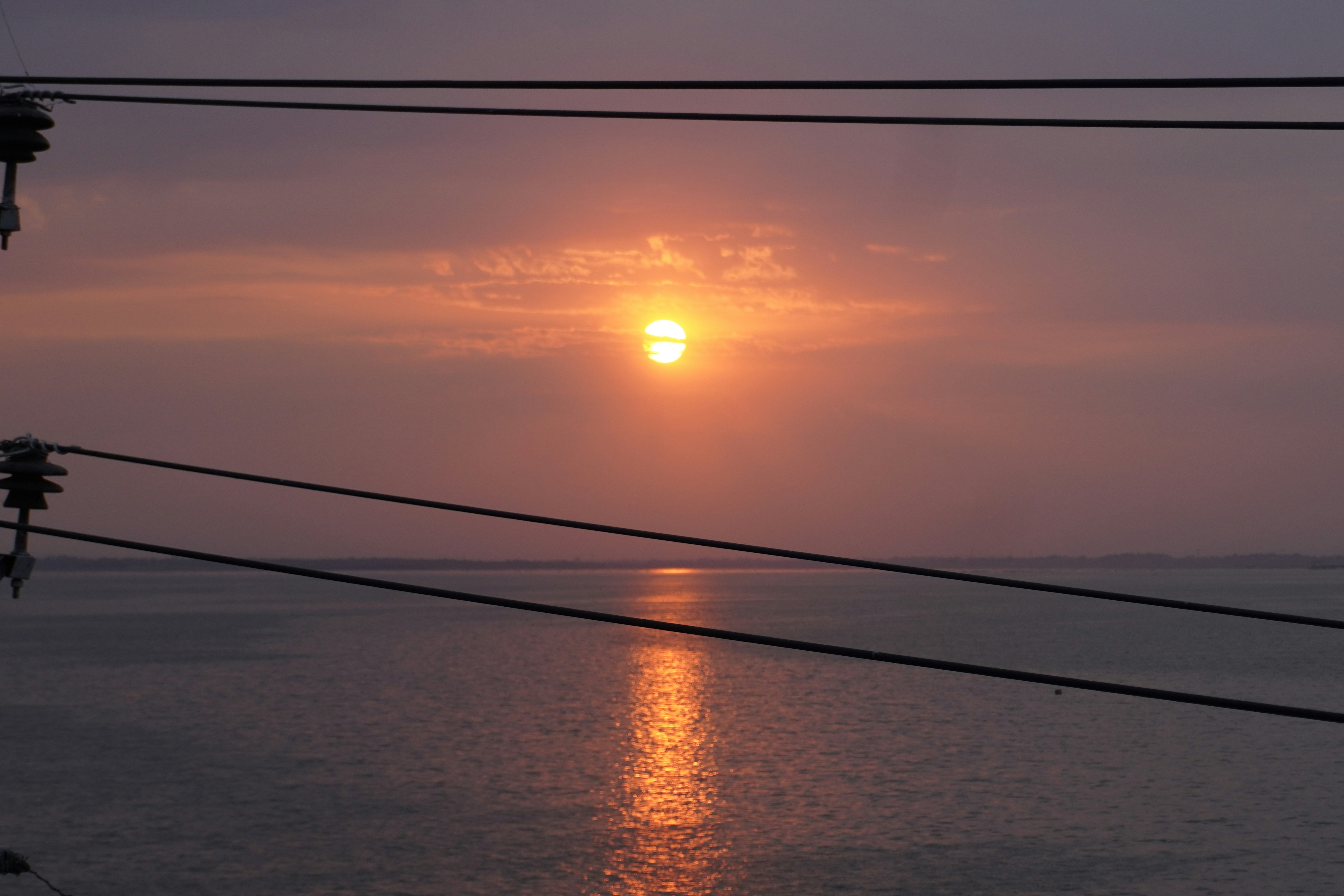 Sunset reflects on the water.