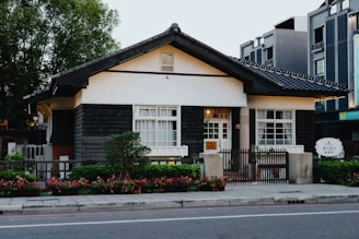 Traditional asian-style house with black and white accents.
