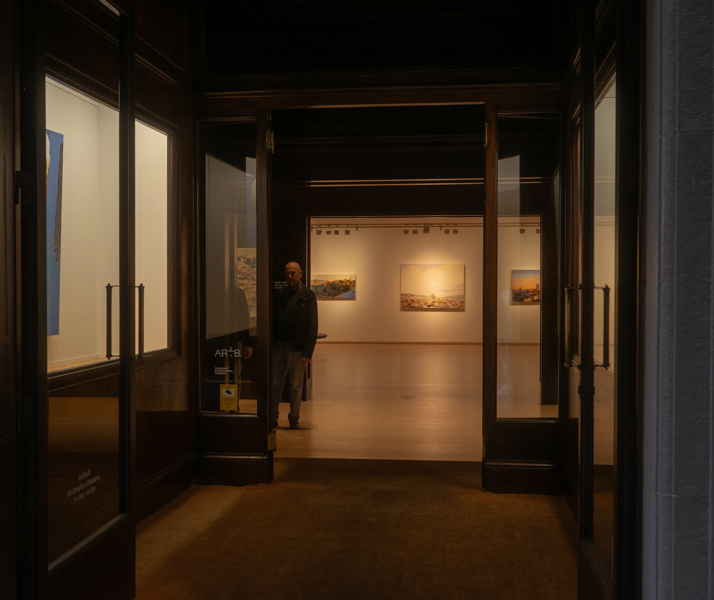 Long sightline through interconnected gallery rooms