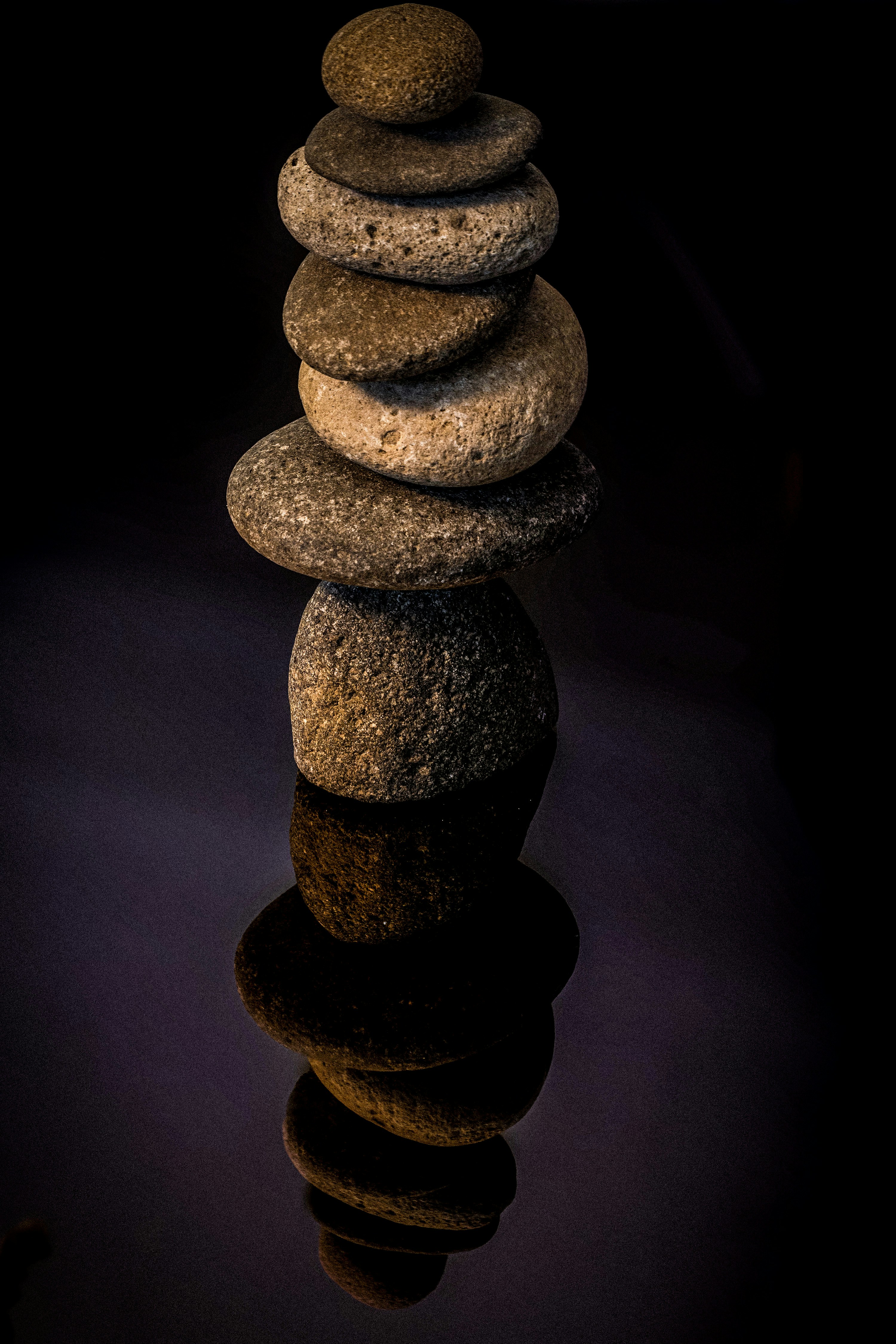 Stones are balanced in a zen-like tower.