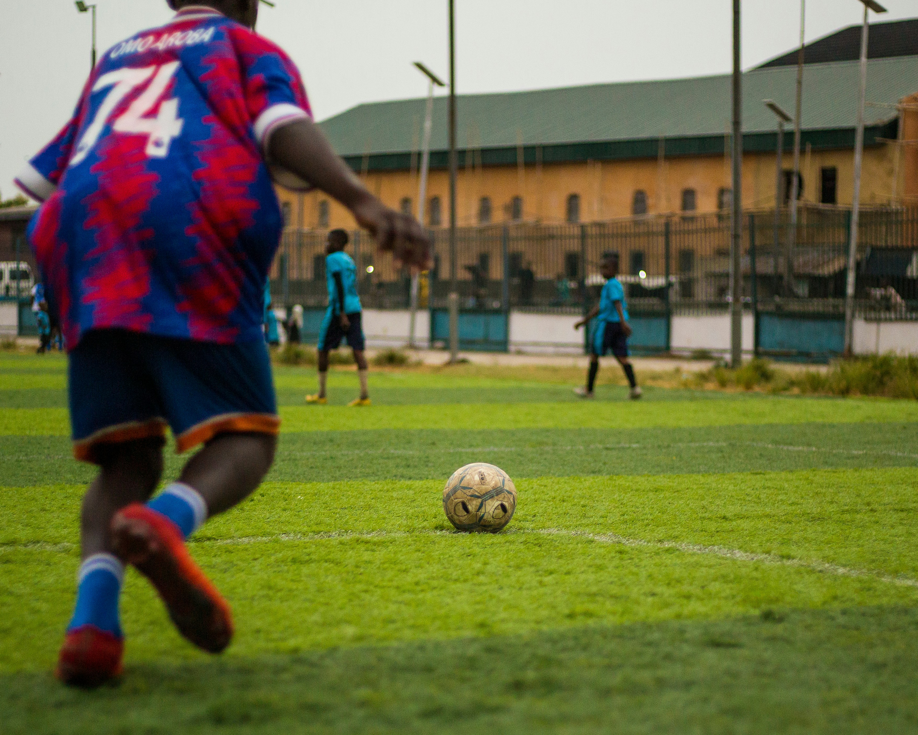 Soccer player about to kick ball