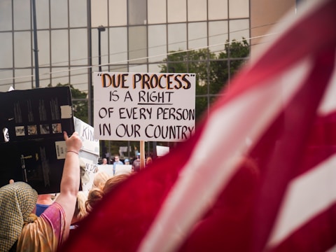 Protestors demonstrate for due process rights.