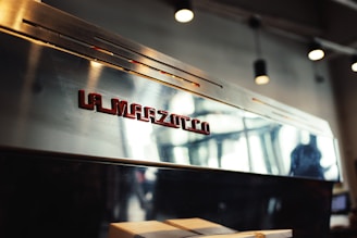 A la marzocco espresso machine is displayed.