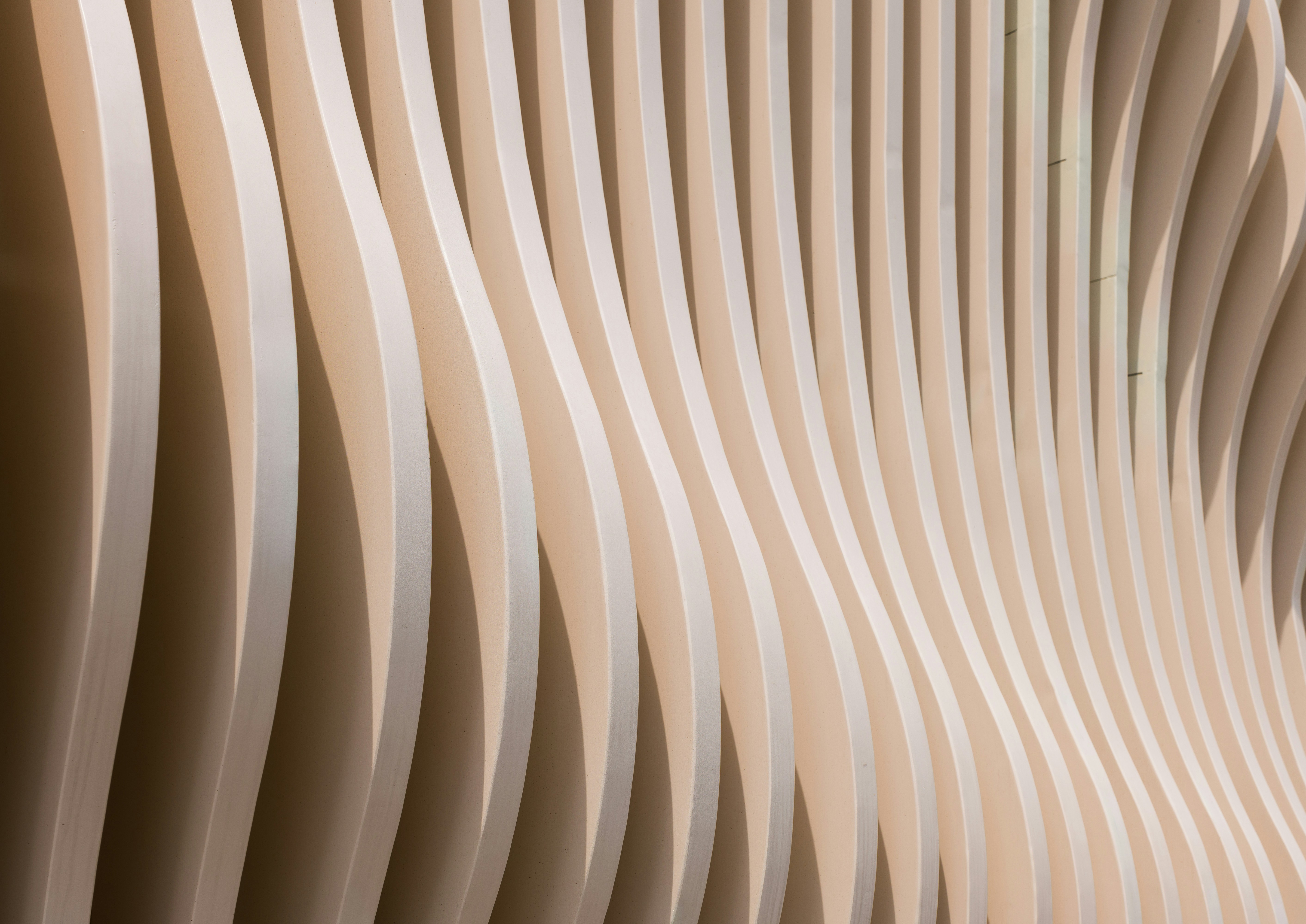 Wooden slats create a beautiful, wavy pattern.