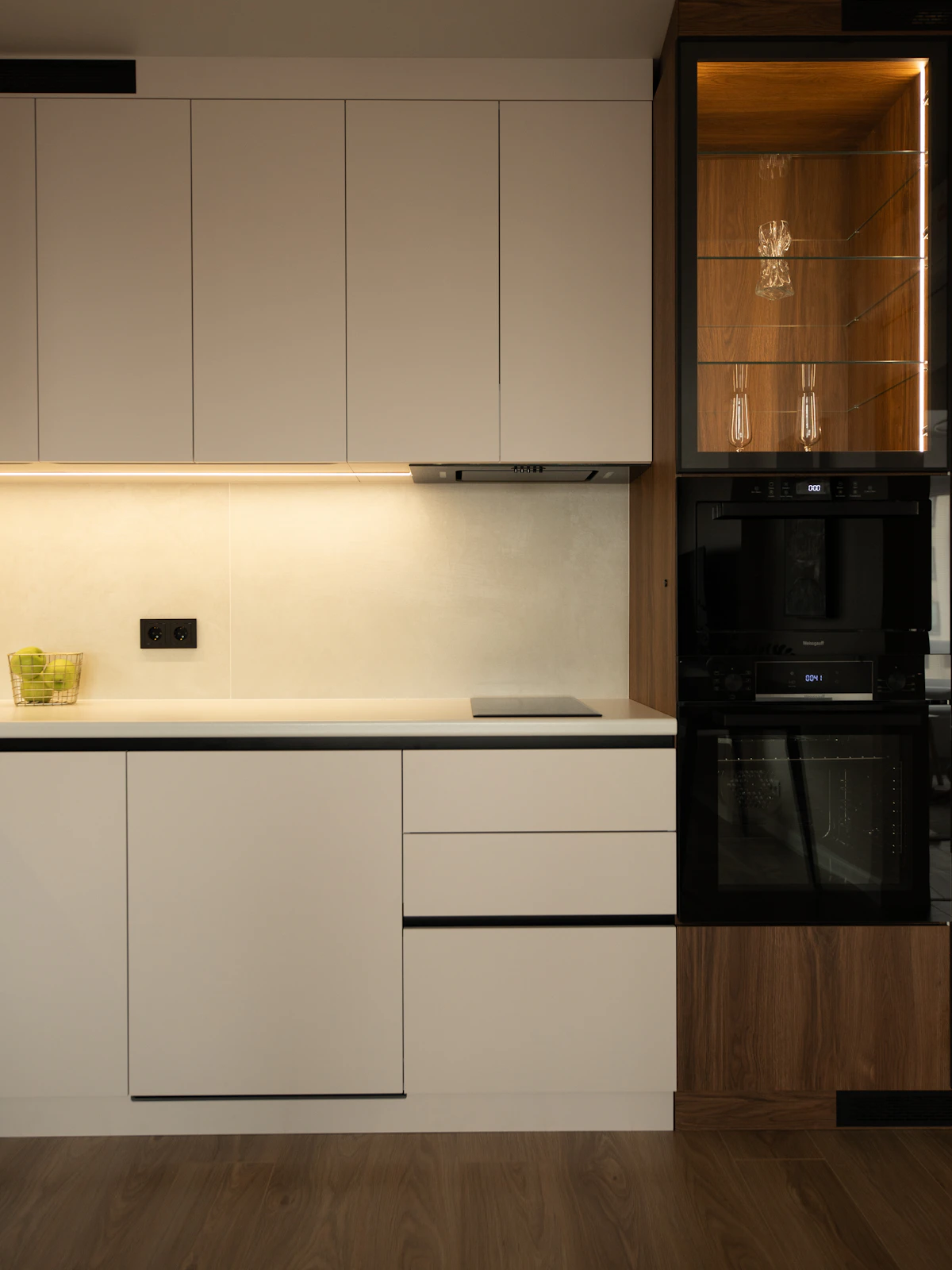 Modern fitted kitchen with white cabinets