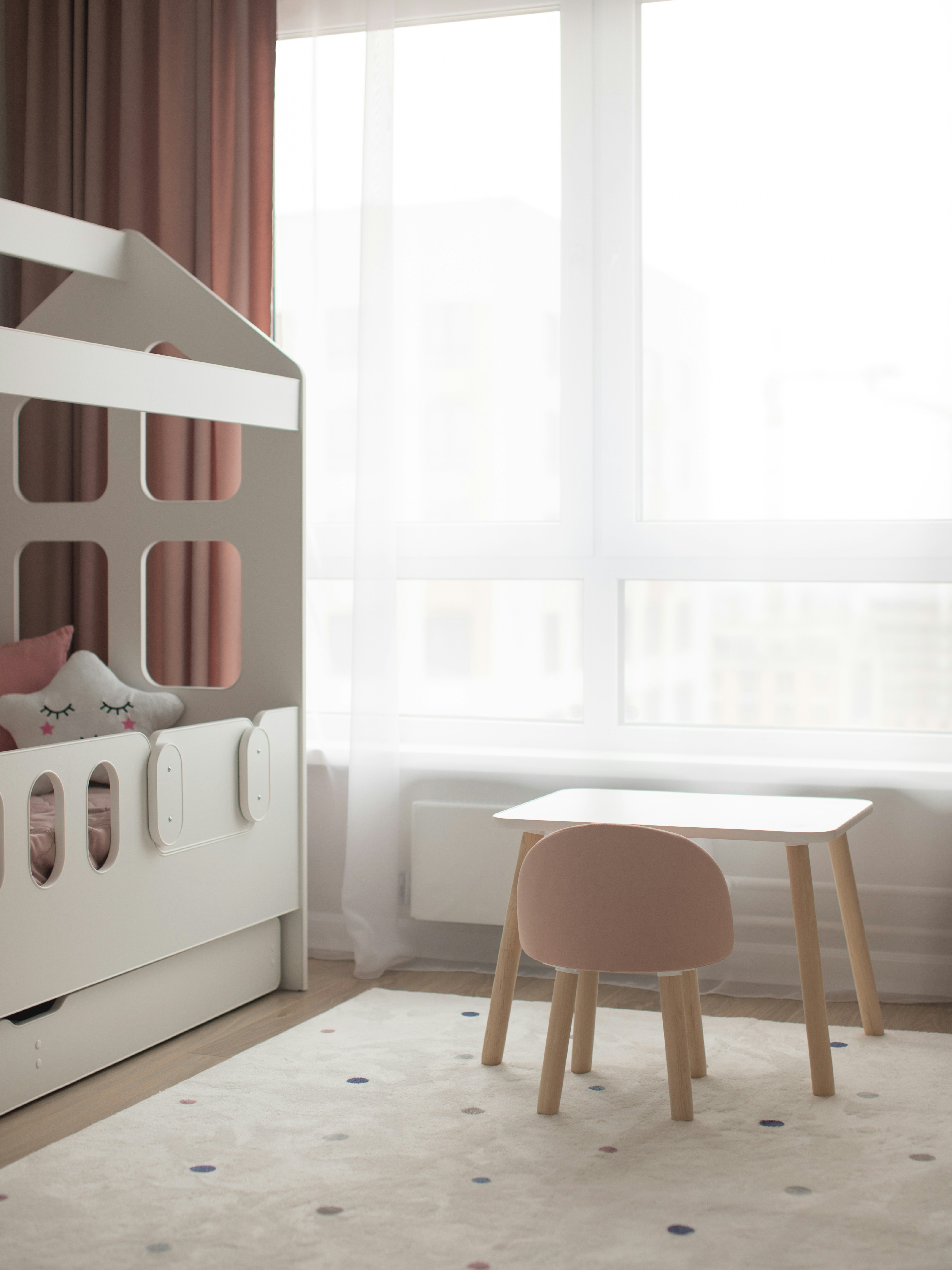 A cozy child's room with a playful design.