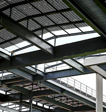 Steel beams and roofing in a modern construction.