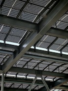 Solar panels are installed on a steel-framed roof.
