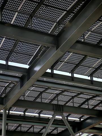Solar panels are installed on a steel-framed roof.