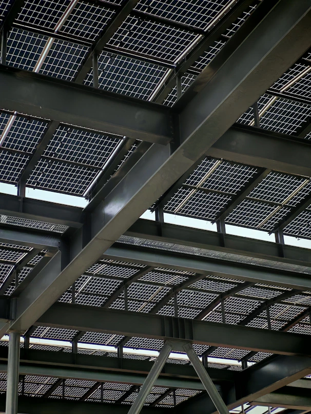 Solar panels are installed on a steel-framed roof.