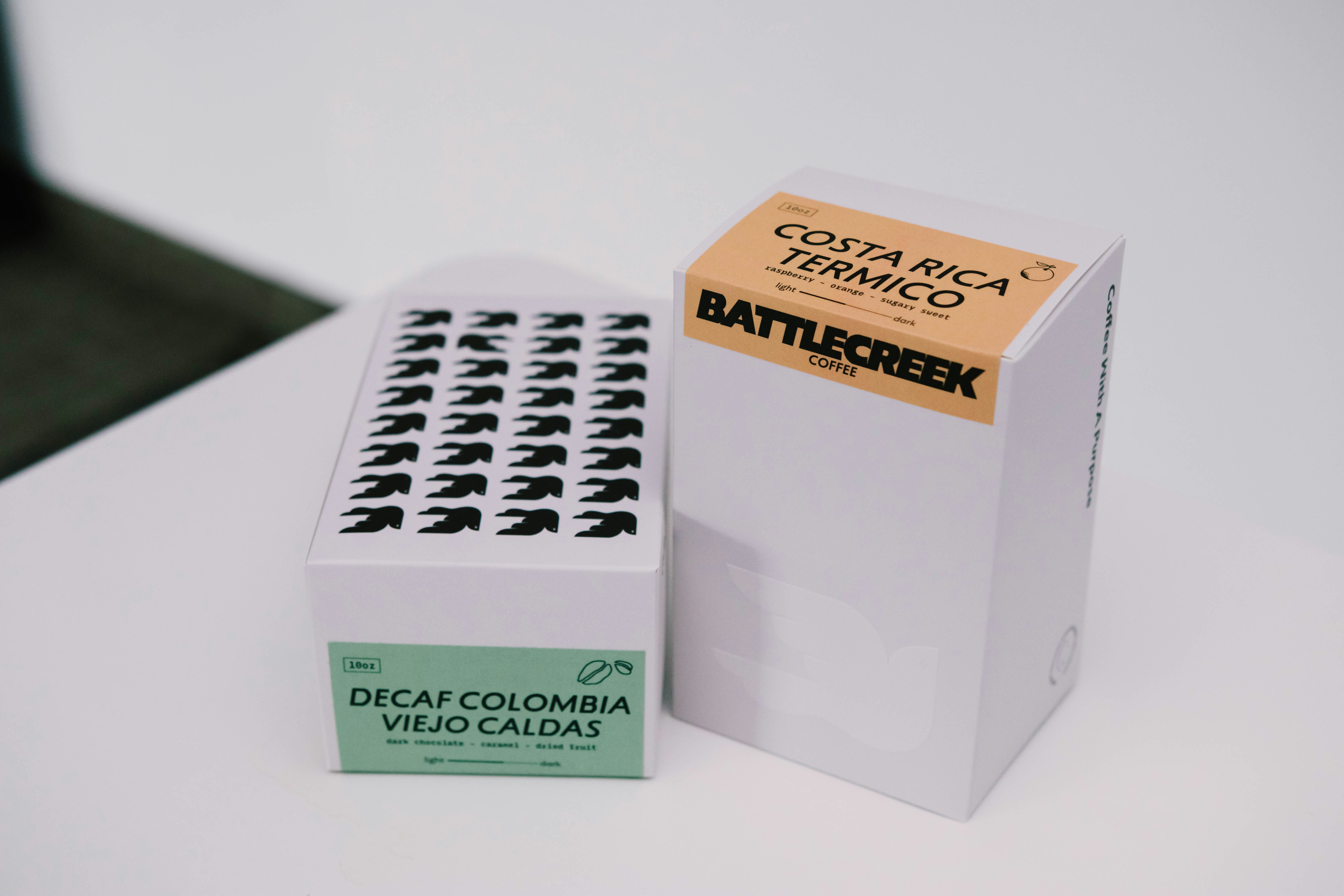 Coffee boxes of different brands and types.