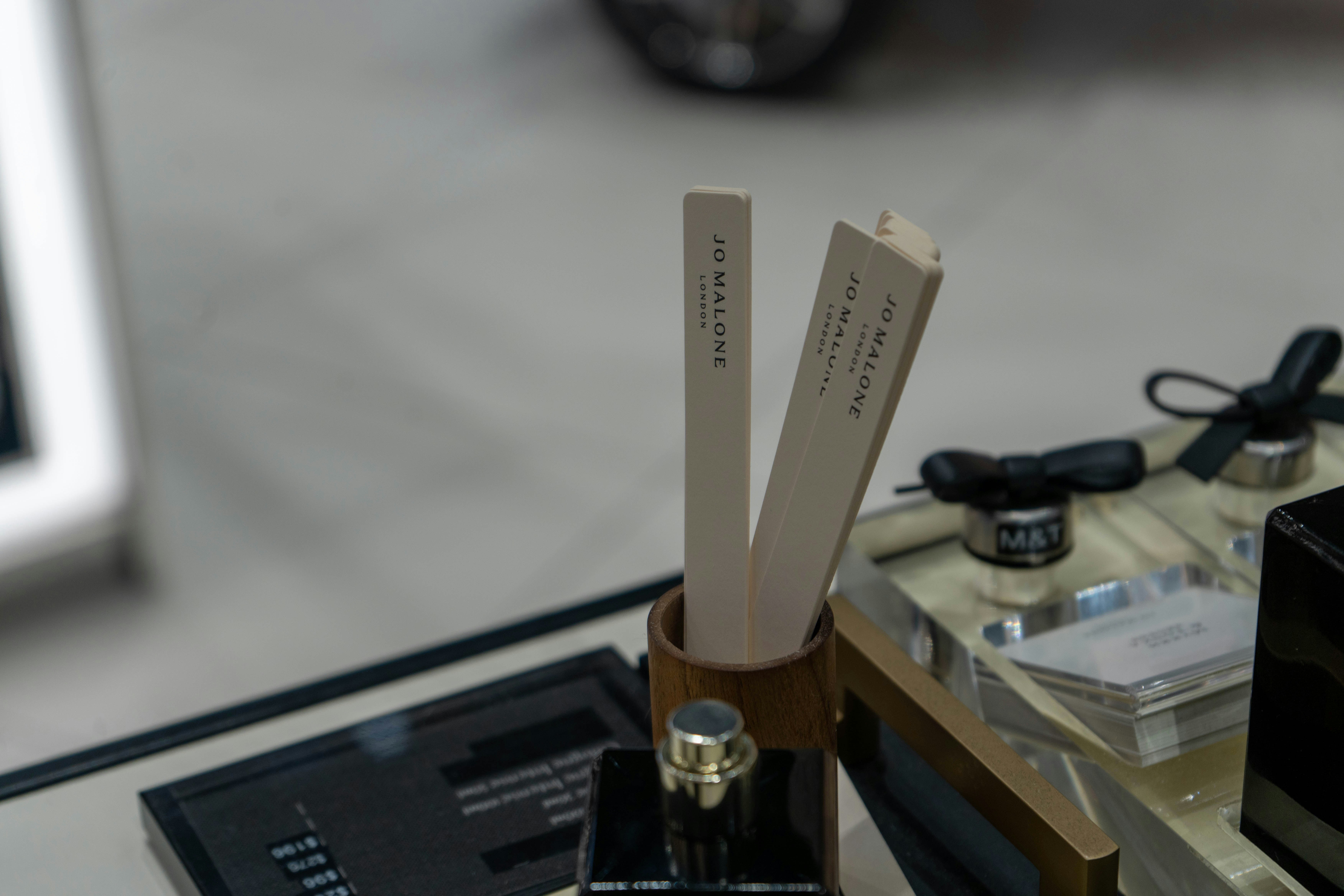 Scent strips rest on a display table.