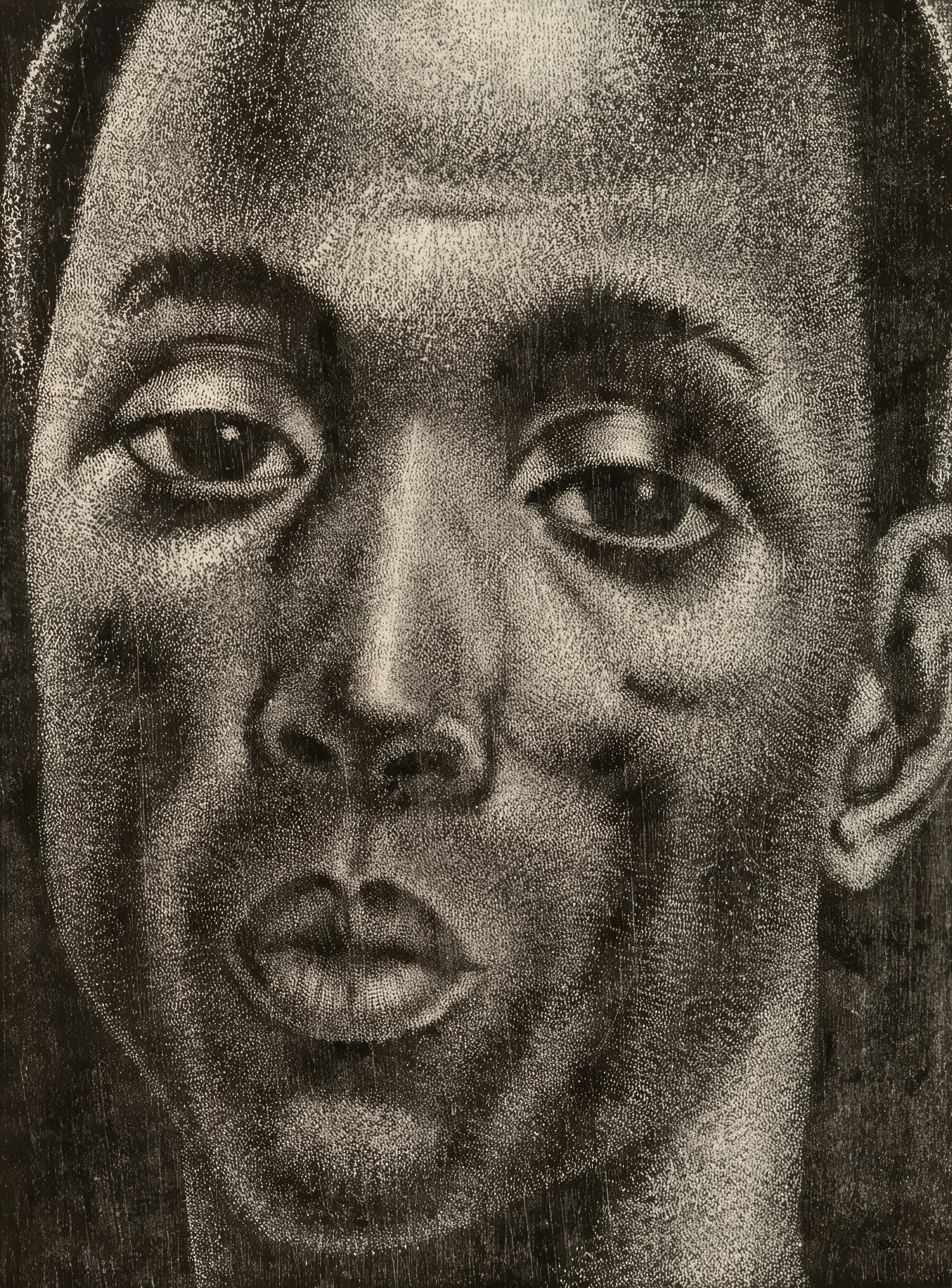 Close-up of a man's face with textured skin.