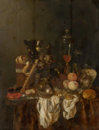 Still life with fruit, bread, and musical instrument.
