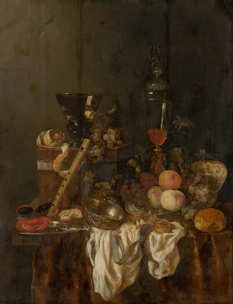 Still life with fruit, bread, and musical instrument.