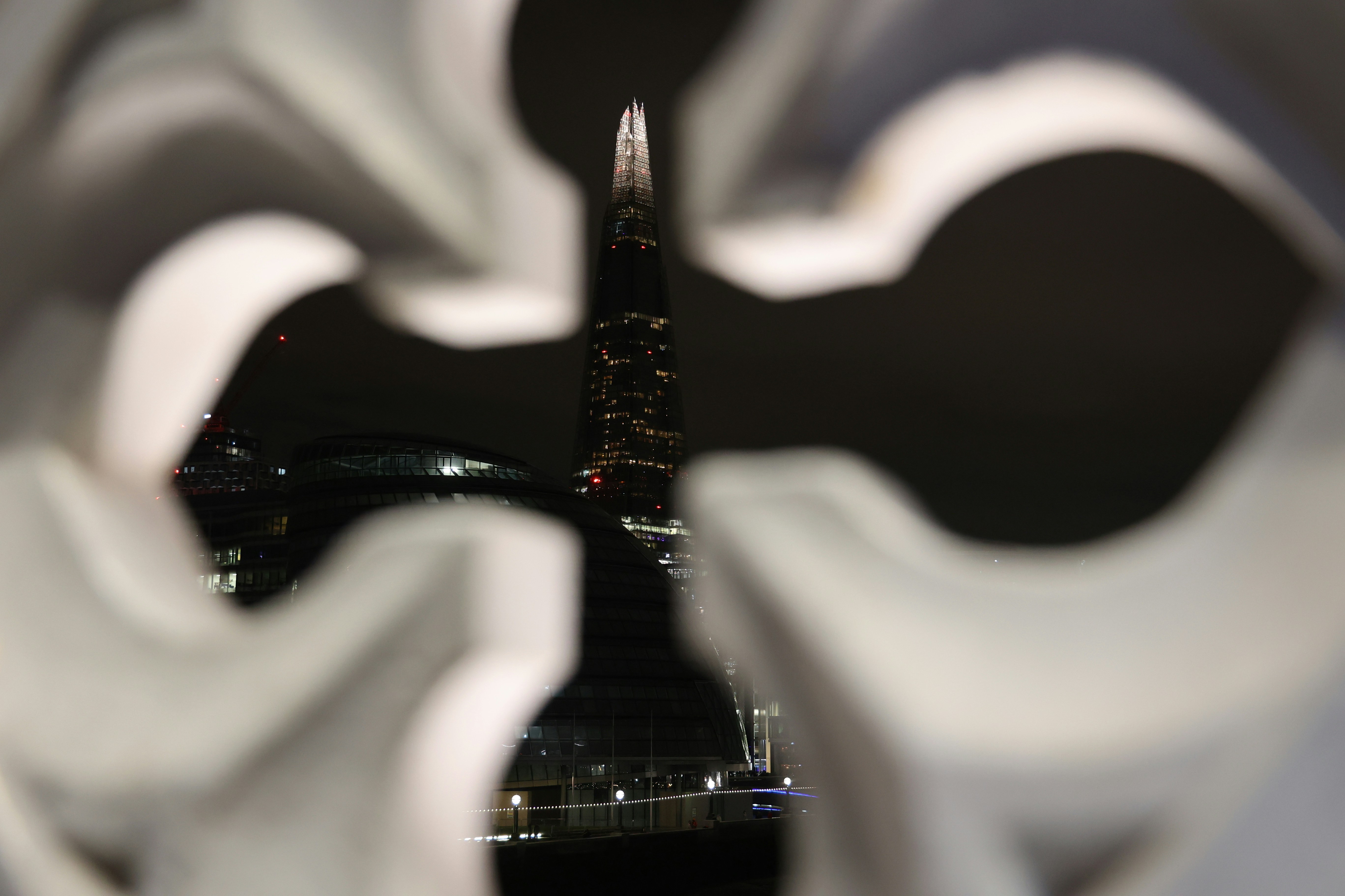 The shard, seen through an artistic white design.