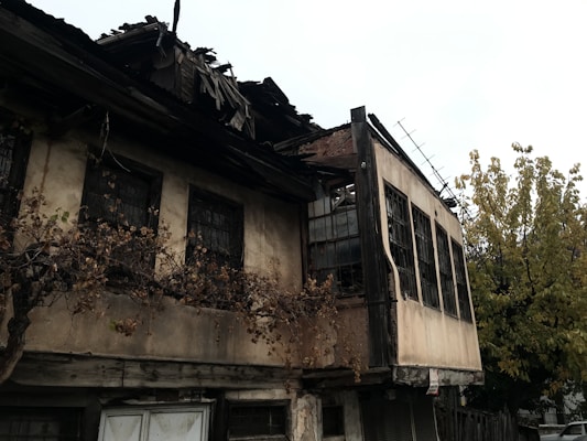 The house is severely damaged by fire.