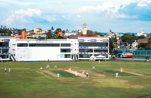 Cricket match in progress at the stadium.