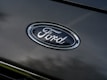 The ford logo is displayed on a car.