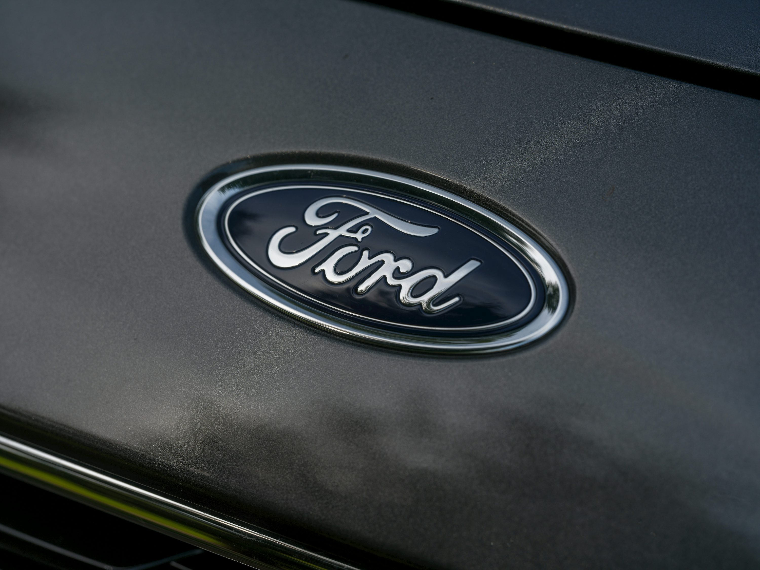 The ford logo is displayed on a car.