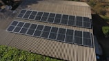 Solar panels are installed on a rooftop.