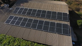 Solar panels are installed on a rooftop.