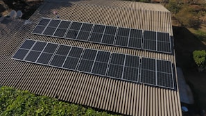 Solar panels are installed on a rooftop.