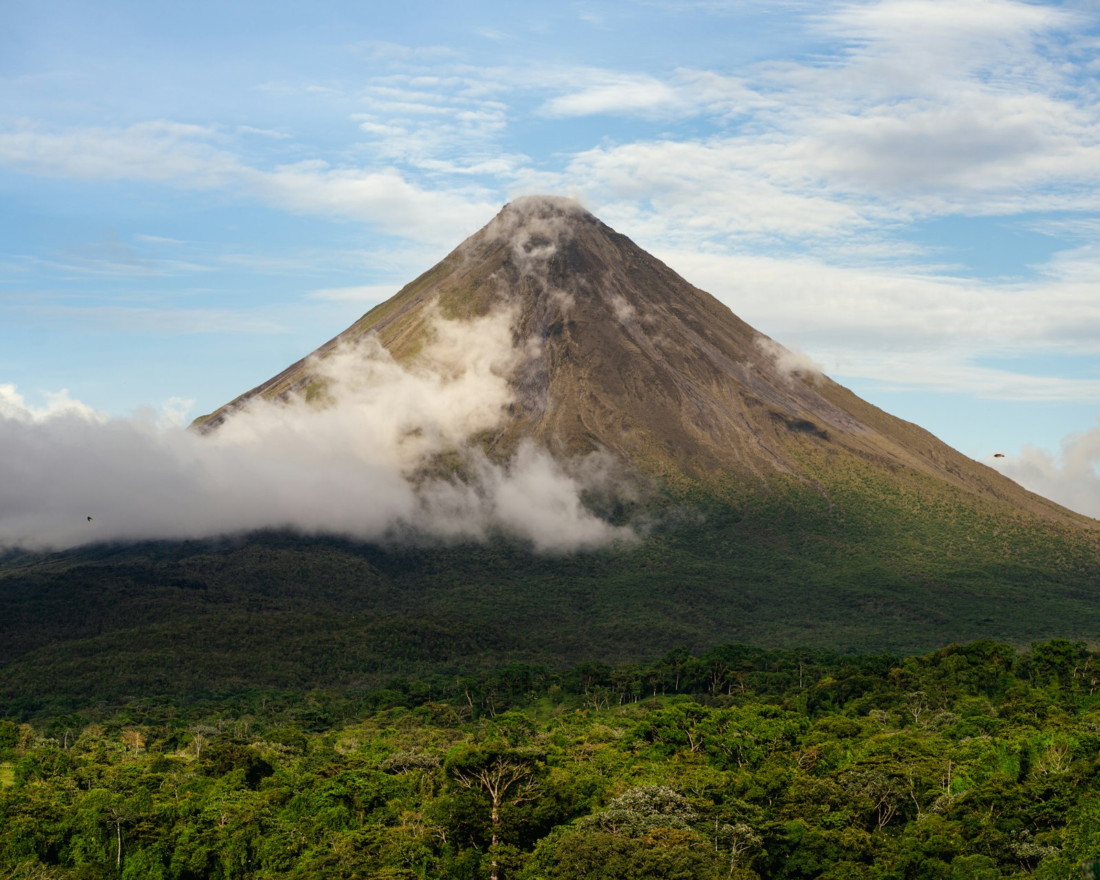 Arenal Volcano rising above the rainforest in Costa Rica