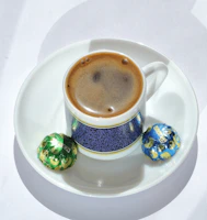 Coffee and chocolates sit ready to be enjoyed.